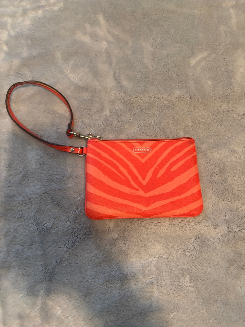 Coach Coral-Orange Zebra Print Wristlet